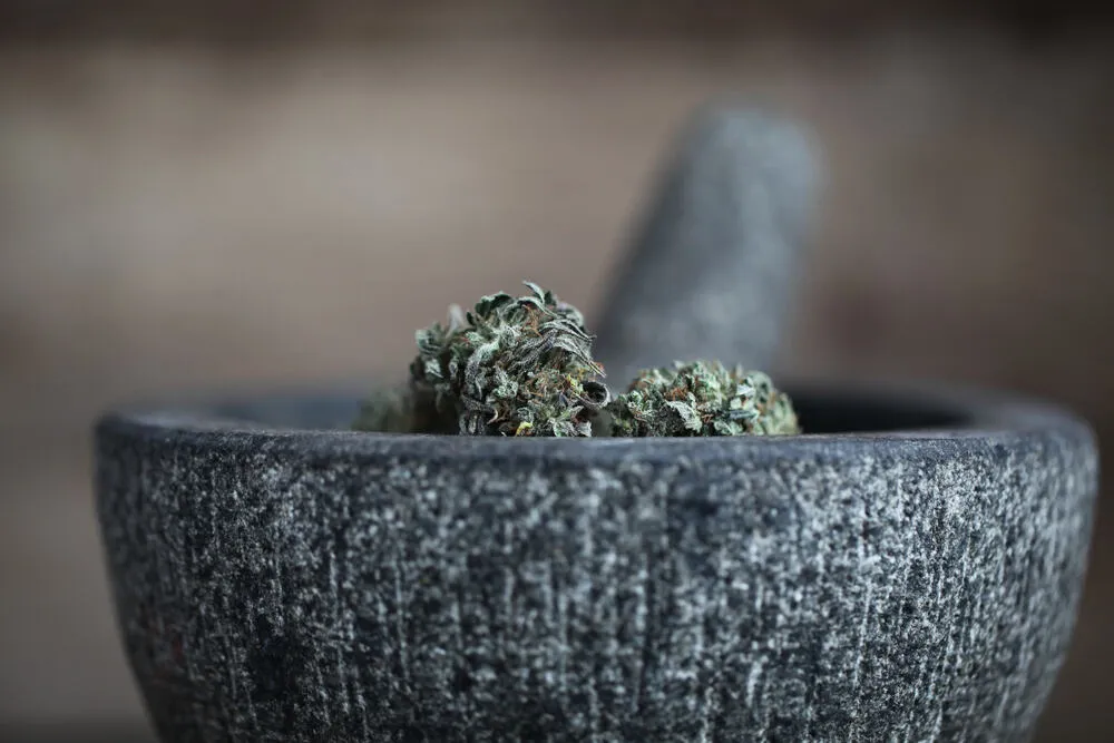 Grinding weed in a pestel and mortar instead of a grinder